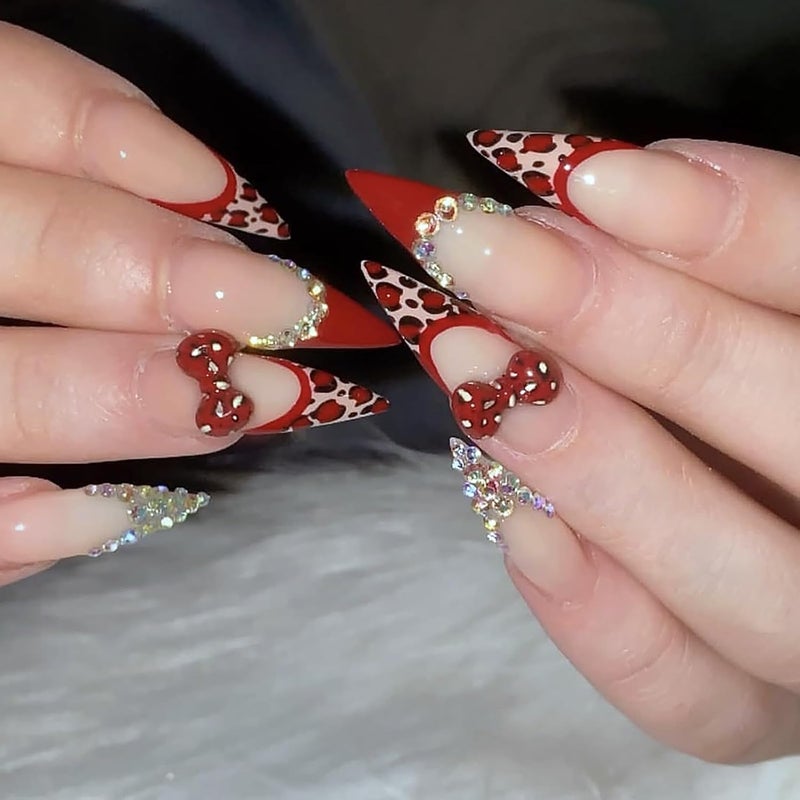 ASABITE 24Pcs Long Stiletto Press on Nails Red French Tip Fake Nails with 3D Bow Leopard Rhinestone Design Artificial False Nails Long Almond Nails Press ons Handmade Glue on Nail for Women Nail Decoration - Image 1